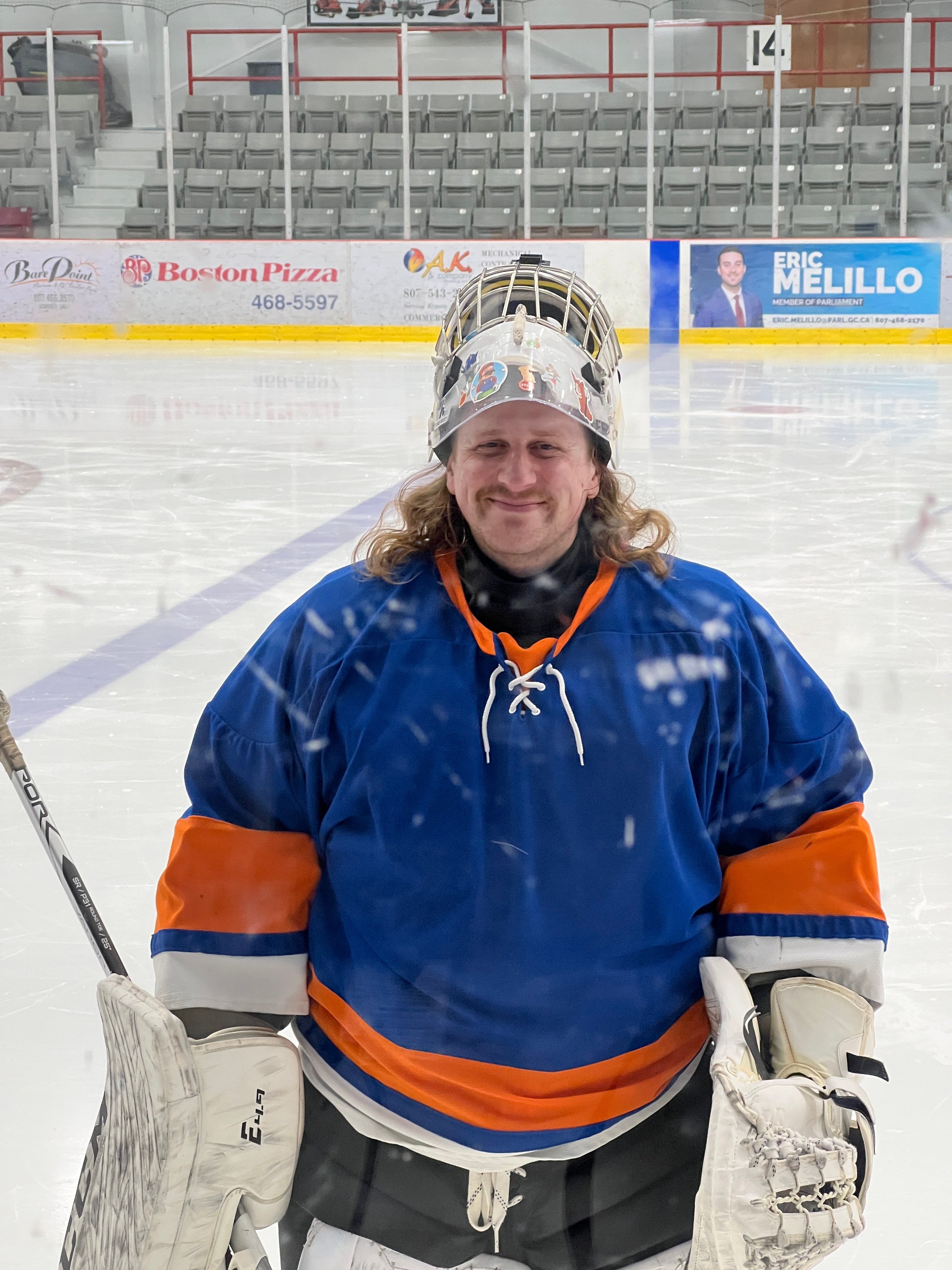 Nich dressed as a goalie on ice